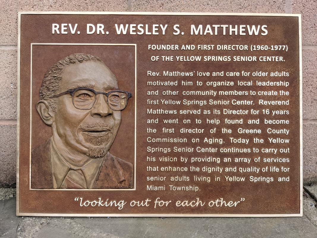 Brass plaque with likeness of Rev. Dr. Wesley S. Matthews, founder and first director of the Yellow Springs Senior Center.